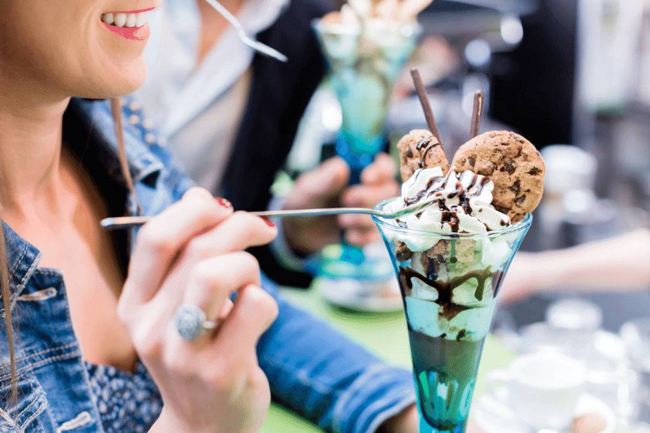 http://tipsyscoop.com/cdn/shop/articles/woman_scooping_ice_cream_sundae_with_chocolate_chip_cookies_1200x630.jpg?v=1639766060